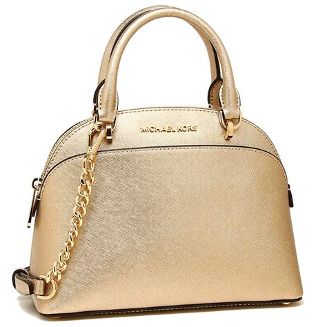 michael kors cream and gold bag|Michael Kors dome crossbody bag.